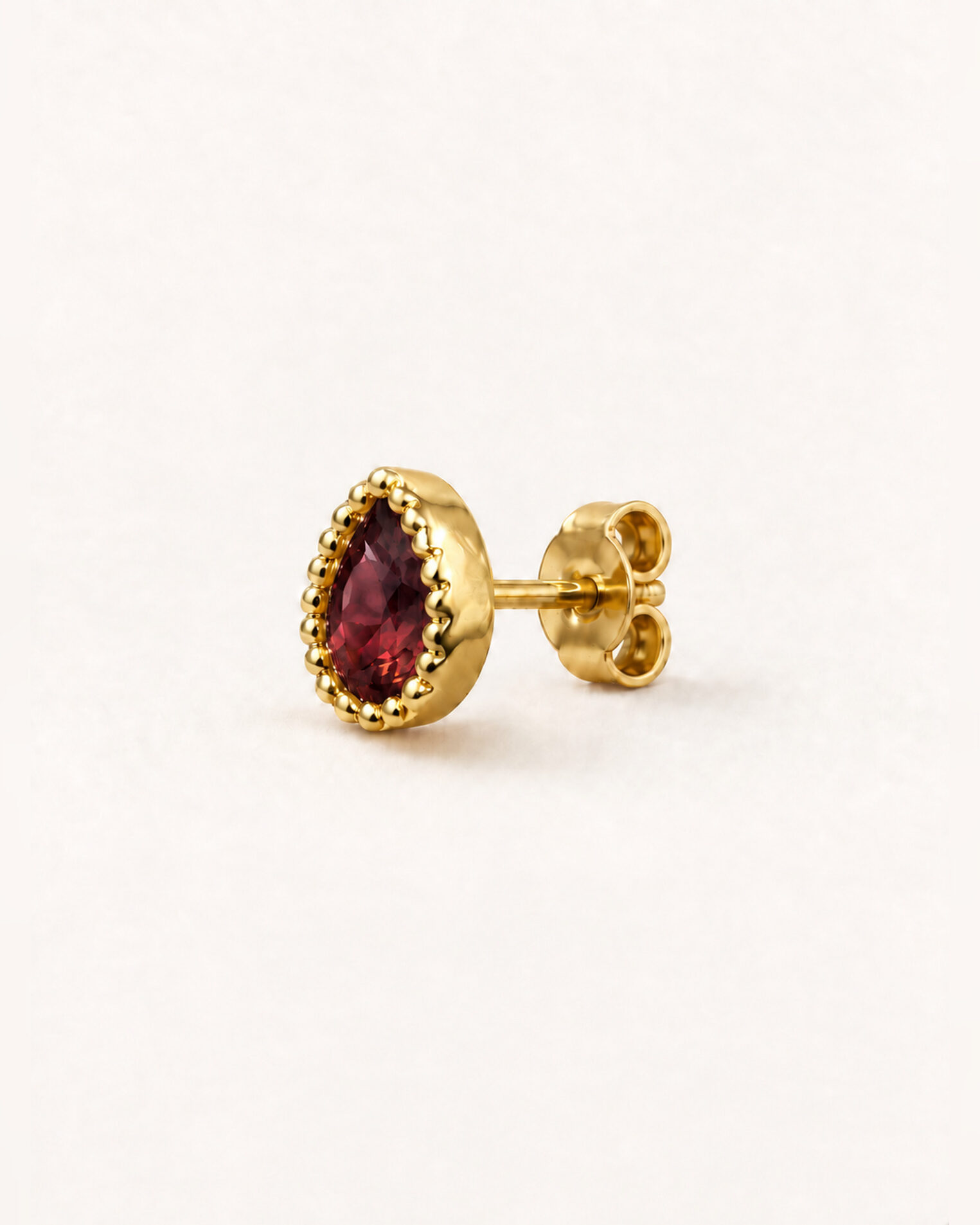 Puce d'oreille Chakras en vermeil 18 cts et grenat