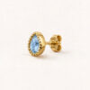 Puce d'oreille Chakras en vermeil 18 cts et topaze bleue